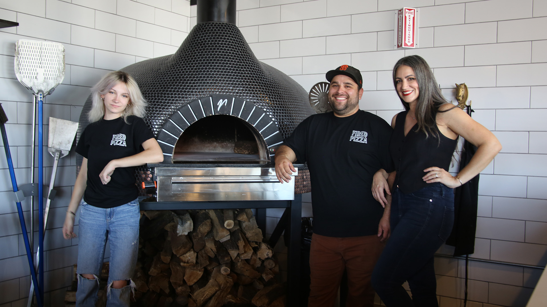 Fired Pizza Team with their Mugnaini Pizza Oven. An excellent oven for restaurants.